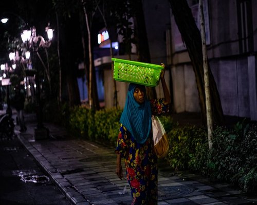 calm evening walk in an Indonesian city